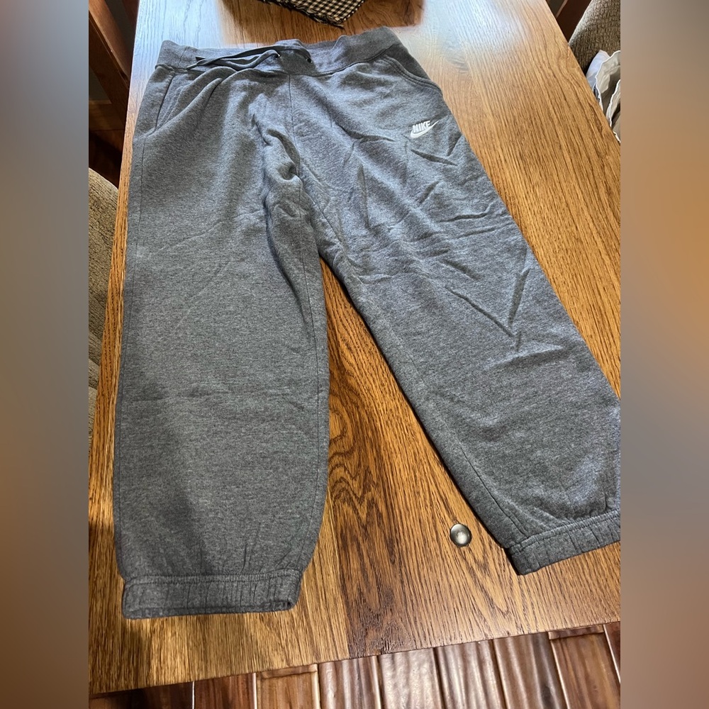 Nike womens Charcoal Sweatpants. Cropped with elastic.